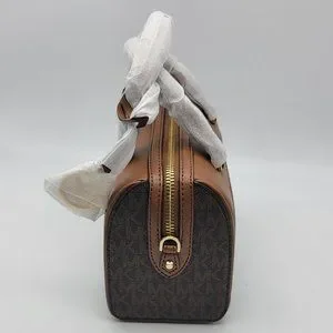 大人気★MICHAEL KORS★TRAVEL XS DUFFLE XBODY Michael Kors XS Travel Duffle Xbody Bag in Brown at Luxe Purses